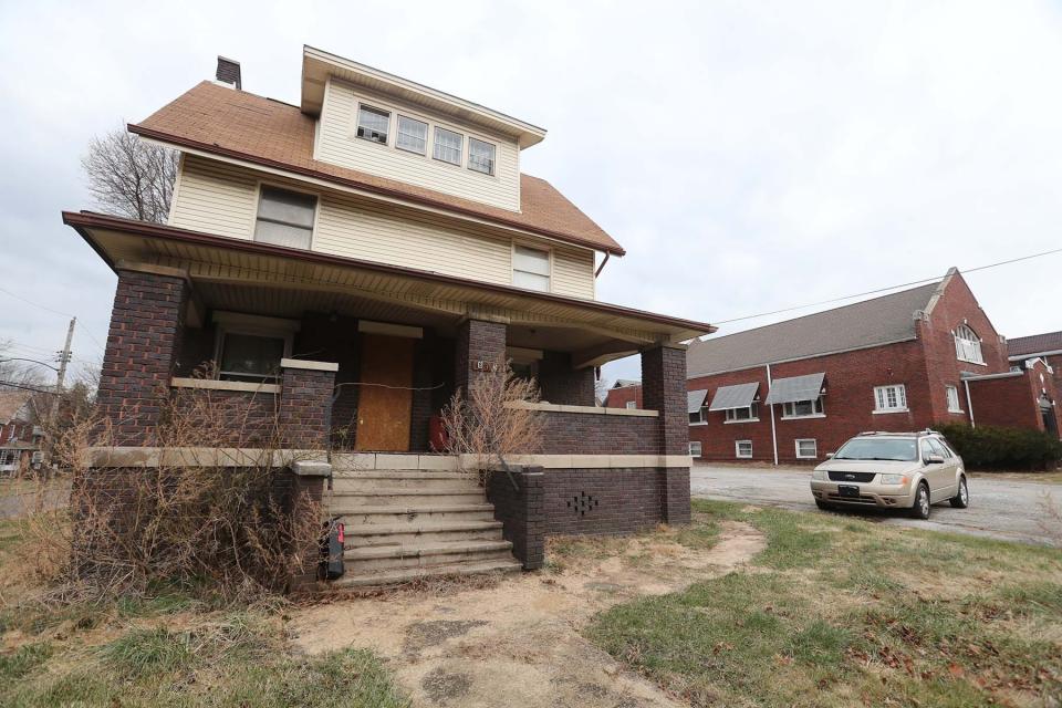 The site of the former funeral home next to the abandoned Akron church of Shawnte Hardin where state investigators this week seized what appear to be cremated remains of at least 89 people