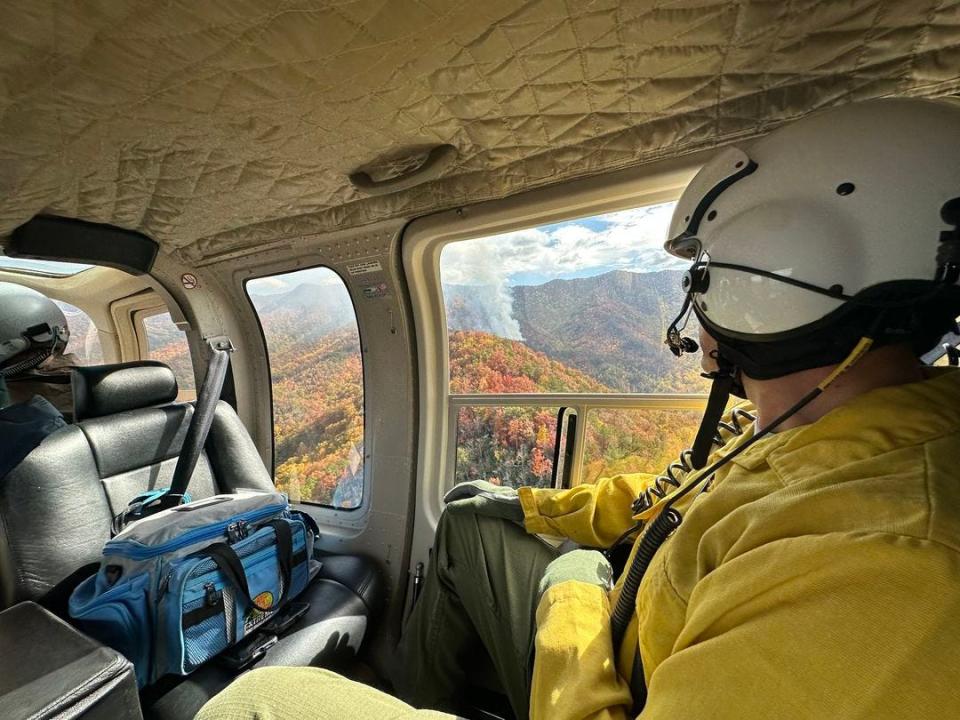 A total of 54 crew members continue to fight a wildfire in Nantahala National Forest, which continues to grow without containment from when it first started Oct. 23.