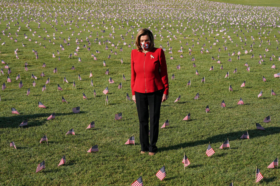 Image: American flags representing 200,000 lives lost due to coronavirus are placed on National Mall in Washington (Joshua Roberts / Reuters)