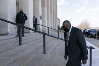 Defense Secretary Lloyd Austin arrives at the Pentagon, Friday, Jan. 22, 2021, in Washington. (AP Photo/Alex Brandon)