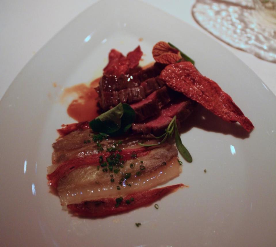 Grilled Wagyu flank steak, with a piquillo pepper chip.