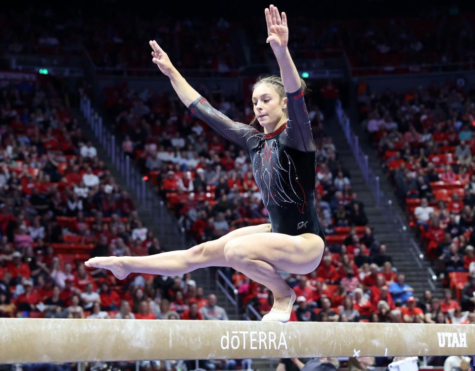 Utah’s Grace McCallum does her beam routine as the Utah Red Rocks compete against Oregon State in a gymnastics meet at the Huntsman Center in Salt Lake City on Friday, Feb. 2, 2024. Utah won. | Kristin Murphy, Deseret News