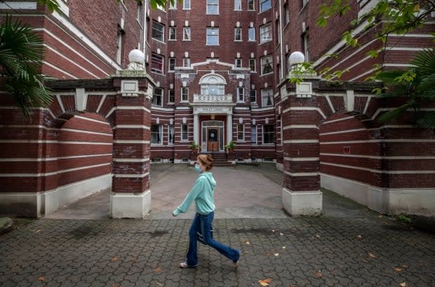 Tenants of Holly Lodge in Vancouver's West End are being asked to sign up with a new utility company owned by the landlord of the building. (Ben Nelms/CBC - image credit)