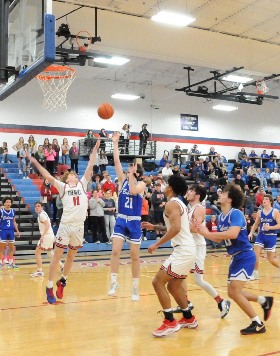 Cambridge sophomore Rylan Mathews adds two to the board for the Bobcats during the Sectional Finals against Indian Valley.