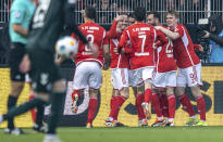 Union Berlin players celebrate after Vertessen's goal during the Bundesliga soccer match between 1. FC Union Berlin and Werder Bremen in Berlin, Germany, Saturday March 16, 2024. (Andreas Gora/dpa via AP)