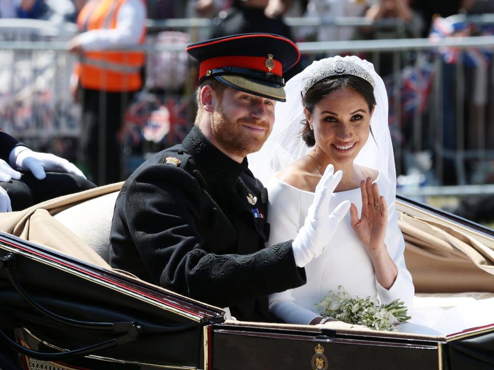 meghan markle and prince harry in their wedding carriage