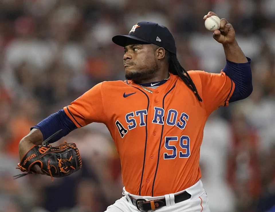 FILE - Houston Astros starting pitcher Framber Valdez throws during the first inning of Game 6 of the baseball AL Championship Series against the Texas Rangers, Oct. 22, 2023, in Houston. The Astros agreed to one-year contracts with six players Thursday, Jan. 11, 2024, including All-Star lefty Valdez, who will make $12.1 million next season. (AP Photo/David J. Phillip, File)