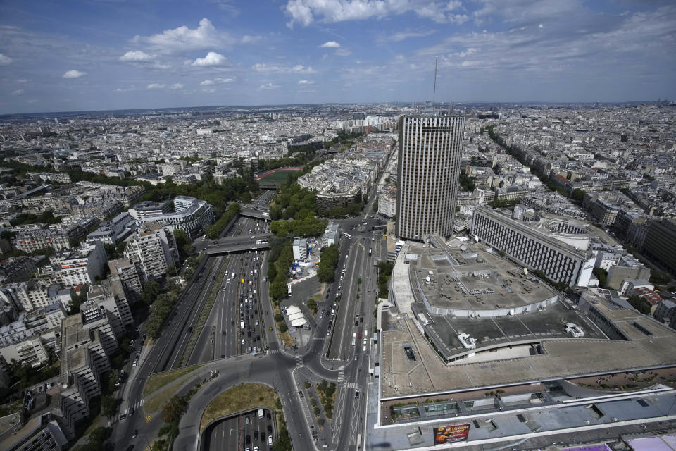 Paris' ring and the Palais des Congres, right, at the Porte Maillot are pictured in Paris, Tuesday, July 11, 2023. The Palais des Congers will host the media center for the Paris 2024 Olympic Games. (AP Photo/Christophe Ena)