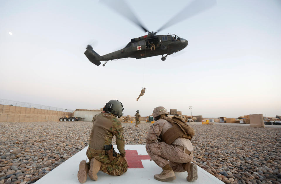 A U.S. Navy corpsman and U.S. soldier take part in a medevac exercise in Helmand province, Afghanistan, July 6, 2017. (Photo: Omar Sobhani/Reuters)