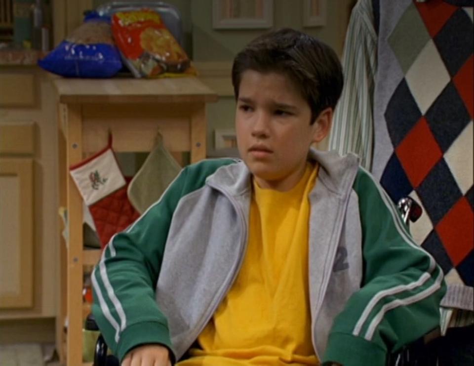 Nathan Kress in a wheelchair