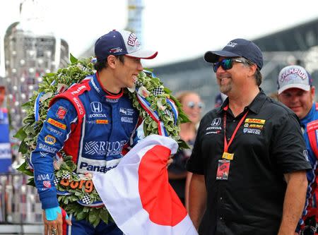 May 28, 2017; Indianapolis, IN, USA; IndyCar Series driver Takuma Sato (left) celebrates with team owner Michael Andretti after winning the 101st Running of the Indianapolis 500 at Indianapolis Motor Speedway. Mandatory Credit: Mark J. Rebilas-USA TODAY Sports