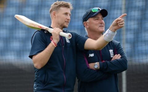 England Test captain Joe Root talks with Graham Thorpe, one of those in the frame for the head coach role - Credit: GETTY IMAGES