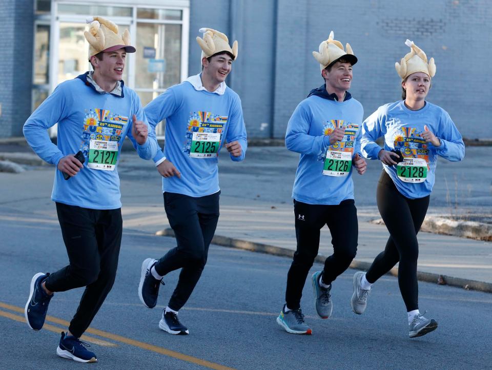 Scenes from 29th annual Turkey Trot on St. Louis Street in downtown Springfield on Nov. 23, 2023.