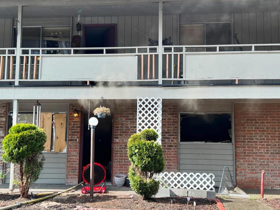 Lacey fire crews extinguish a fire in an apartment unit at the end of Webb Street Southeast on May 19.