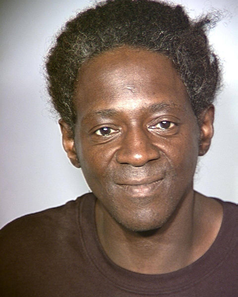 FILE - This police booking file photo released Monday, May 2, 2011 by the Las Vegas Police Department, shows rapper and reality television star Flavor Flav after his arrest Friday, April 29, 2011, on four outstanding misdemeanor warrants for driving offenses. Police in Las Vegas say Wednesday, Oct. 17, 2012, that Flavor Flav was jailed on felony charges stemming from a domestic argument with his fiancee and threats to attack her teenage son with a knife. Officer Bill Cassell said no one was injured before William Jonathan Drayton Jr. was arrested about 3:30 a.m. Wednesday, at a home in a neighborhood several miles southwest of the Las Vegas Strip. (AP Photo/Las Vegas Police Department)