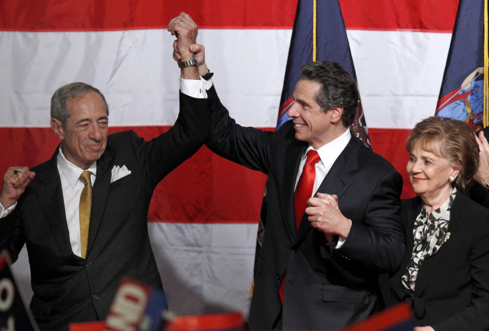 Democratic gubernatorial candidate Andrew Cuomo (C) celebrates with his father Mario (L) and mother Matilda (R) after winning the election for Governor in New York November 2, 2010. (Lucas Jackson/Reuters)