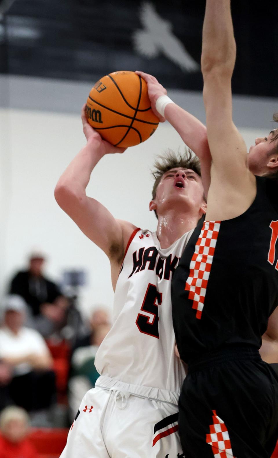 Alta’s Jaxon Johnson drives and shoots against Timpview’s Colton Smith during the boys basketball game Wednesday, Jan. 18, 2023 at Alta High School in Sandy. | Chuck Wing, Deseret News