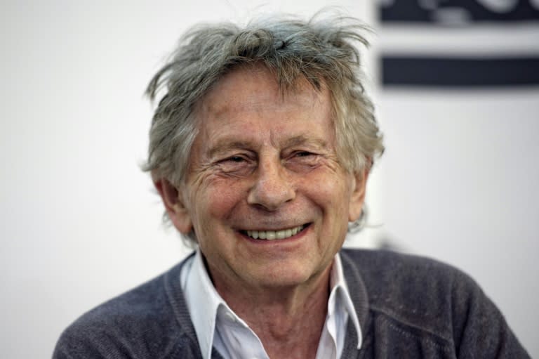 French-Polish film director Roman Polanski smiles during a conference at the Paris Book Fair on March 20, 2015