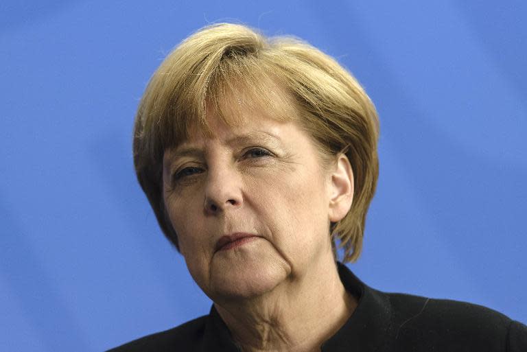 German Chancellor Angela Merkel attends a press conference in Berlin on July 2, 2014