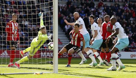 Britain Soccer Football - Sunderland v West Ham United - Premier League - Stadium of Light - 15/4/17 West Ham United's James Collins scores their second goal Action Images via Reuters / Ed Sykes Livepic