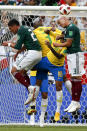 <p>Mexico’s Carlos Salcedo heads the ball during the round of 16 match between Brazil and Mexico at the 2018 soccer World Cup in the Samara Arena, in Samara, Russia, Monday, July 2, 2018. (AP Photo/Eduardo Verdugo) </p>