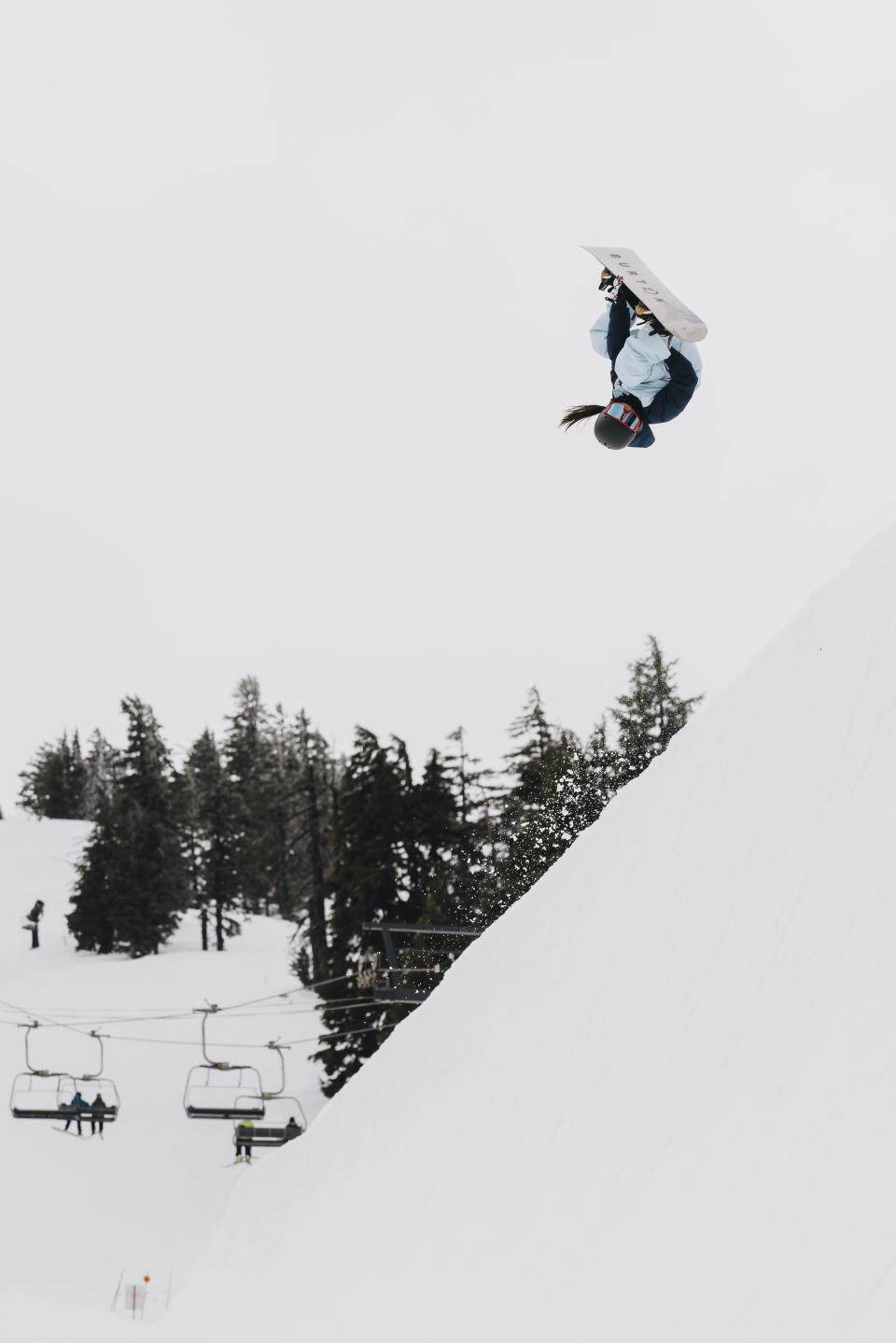 Patti Zhou, 11, showboards at Mount Bachelor, near Bend, Oregon, April 27, 2022. The Beijing-born, Colorado-living Zhou could be the next big thing in the halfpipe and slopestyle, including this weekend during her Dew Tour debut in Copper Mountain, Colorado. (Jesse Dawson/Burton Snowboards via AP)