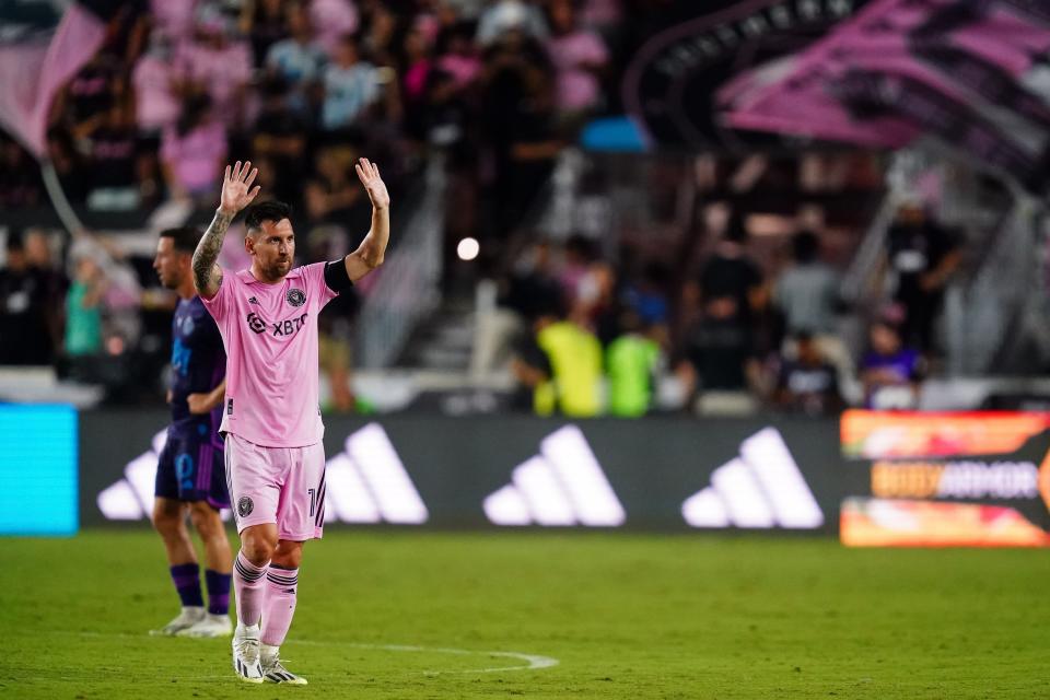 Lionel Messi waves to the crowd after scoring a goal in the second half against Charlotte FC.