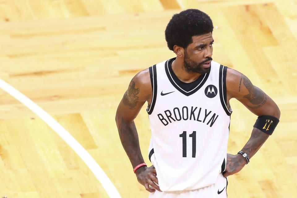 BOSTON, MA - MAY 28:  Kyrie Irving #11 of the Brooklyn Nets looks on during Game Three of the Eastern Conference first round series against the Boston Celtics at TD Garden on May 28, 2021 in Boston, Massachusetts. NOTE TO USER: User expressly acknowledges and agrees that, by downloading and or using this photograph, User is consenting to the terms and conditions of the Getty Images License Agreement. (Photo by Adam Glanzman/Getty Images)