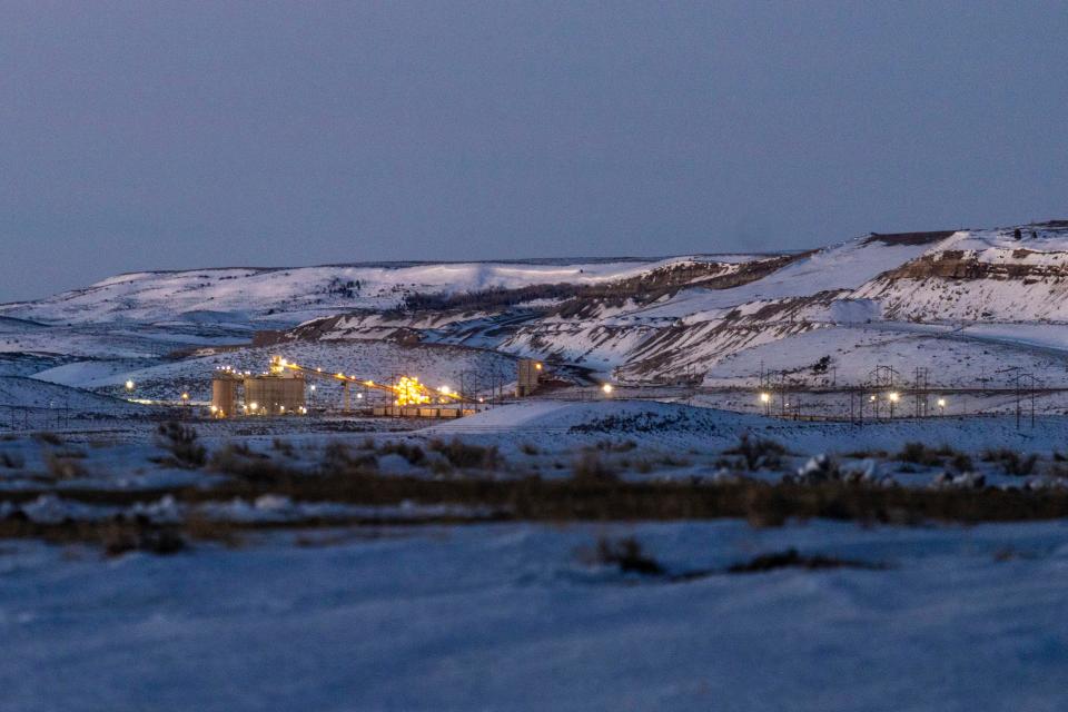 Lights illuminate a coal mine at twilight on Jan. 13 in Kemmerer, Wyo. With the nearby coal-fired Naughton Powerplant being decommissioned in 2025, the fate of the coal mine and its workers is uncertain. More than 500 days into his presidency, Joe Biden’s hope for saving the Earth from the most devastating effects of climate change may not be dead. But it’s not far from it after a Supreme Court ruling not only limited the Environmental Protection Agency’s ability to regulate pollution by power plants, but also suggests the court is poised to block other efforts to limit the climate-wrecking fumes emitted by oil, gas and coal.