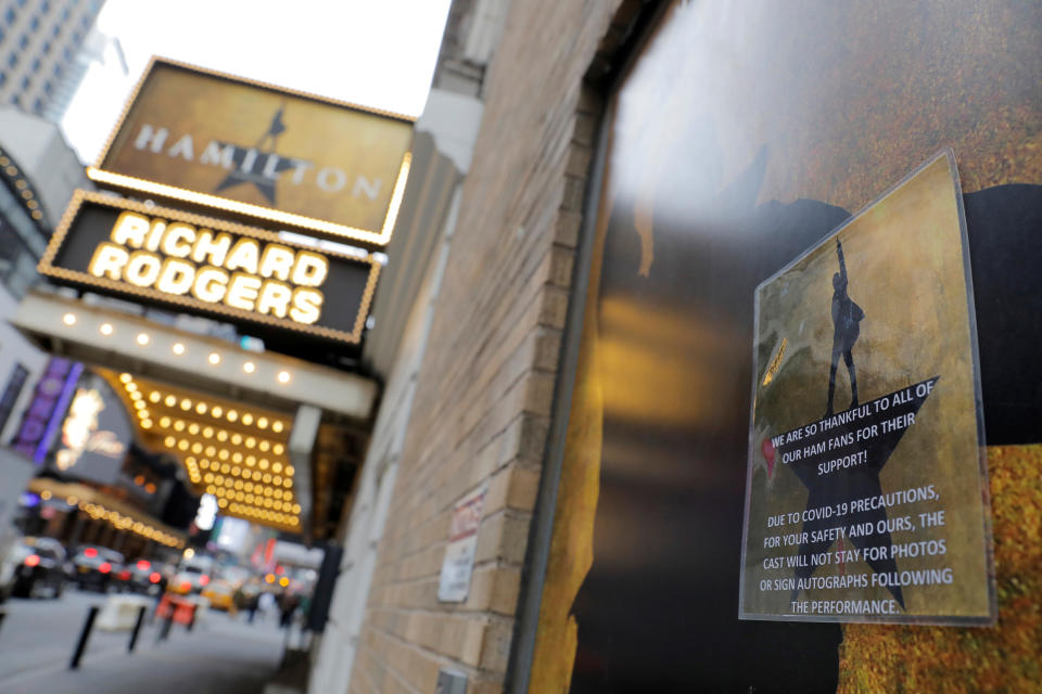 Signage regarding the coronavirus is seen on a doorway to the show Hamilton at the Richard Rodgers theater as Broadway shows announced they will cancel performances due to the coronavirus outbreak in Manhattan, New York City, New York, U.S., March 12, 2020. (Andrew Kelly/Reuters)