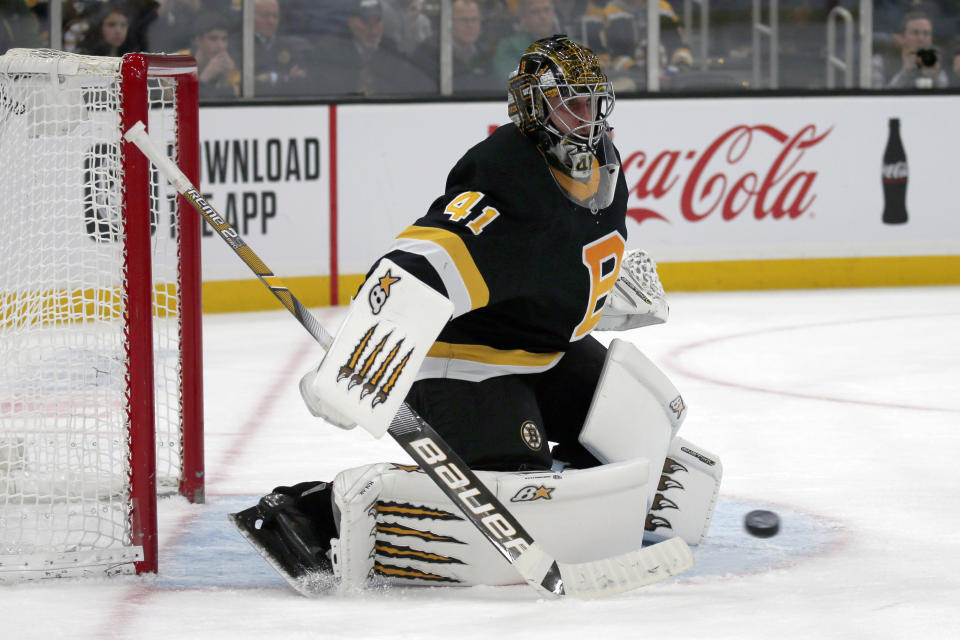 Boston Bruins goaltender Jaroslav Halak (41) makes a pad save during the third period of an NHL hockey game against the Pittsburgh Penguins, Thursday, Jan. 16, 2020, in Boston. (AP Photo/Mary Schwalm)