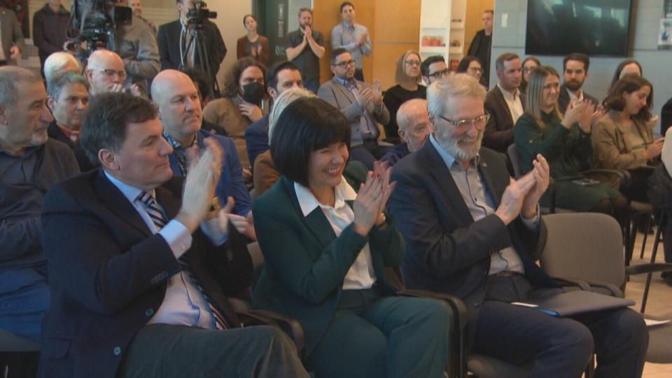 Federal ministers who represent New Brunswick ridings Dominc LeBlanc (left) and Ginette Petitpas Tayor (centre) were present at Friday's announcement with Mayor Lapierre (right).