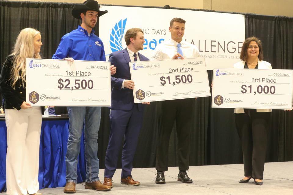 Jordyn Barker (left) and Caleb Thomas took home first place at the Texas A&M University-Corpus Christi's seventh annual Ideas Challenge showcase with their rodeo app idea Wednesday, April 20, 2022. Michael Denton and Dawson Pietsch won second place for their soap tablet idea and Genevieve Ridgway won third for her wine recommendation website.