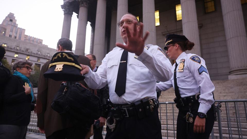 Court police prepare for the arrival of former President Donald Trump to New York State Supreme court for the start of the civil fraud trial against him on October 02, 2023 in New York City. Trump and his associates are being charged with inflating assets in fraudulent financial statements. A ruling last week by a judge determined that Trump and his co-defendants are liable for “persistent and repeated” fraud.