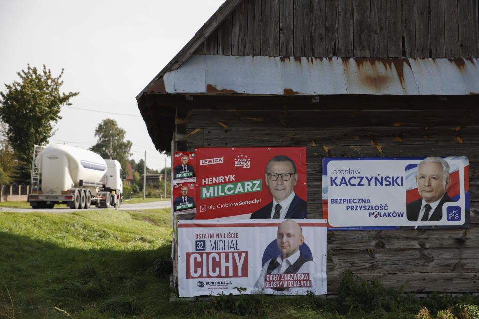 Political campaign banners hang on a building in Gorno, Poland, Wednesday, Oct. 11, 2023. Poland is holding a parliamentary election on Oct. 15 which many Poles view as the most important once since the nation threw off communist rule in 1989. (AP Photo/Michal Dyjuk)