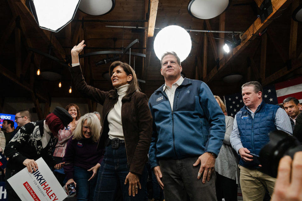 GOP presidential candidate Nikki Haley waves to supporters after receiving the endorsement of New Hampshire Gov. Chris Sununu during a town hall event on Dec. 12, 2023 in Manchester, New Hampshire. / Credit: Sophie Park / Getty Images