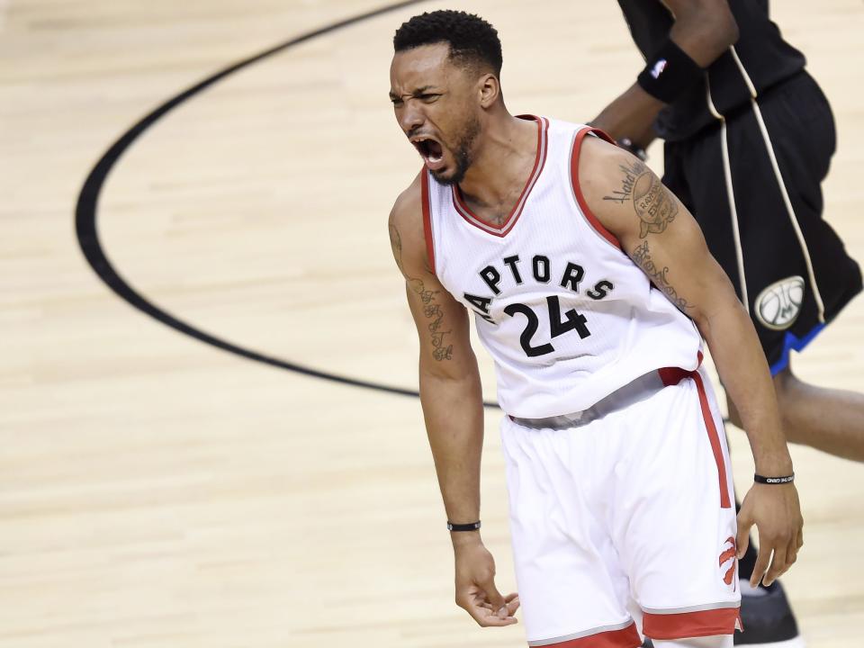 Toronto Raptors guard Norman Powell (24) reacts after dunking against the Milwaukee Bucks during the second half of game five of an NBA first-round playoff series basketball game in Toronto on Monday, April 24, 2017. (Nathan Denette/The Canadian Press via AP)