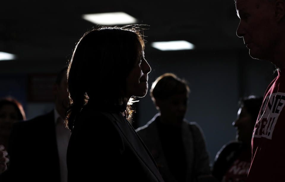 Democratic presidential candidate Sen. Kamala Harris, D-Calif., left, meets with people after speaking at a town hall event at the Culinary Workers Union, Friday, Nov. 8, 2019, in Las Vegas. (AP Photo/John Locher)