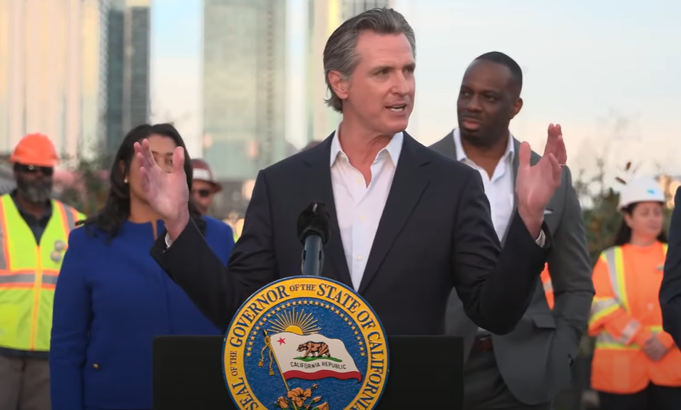 Gov Gavin Newsom speaking at an event