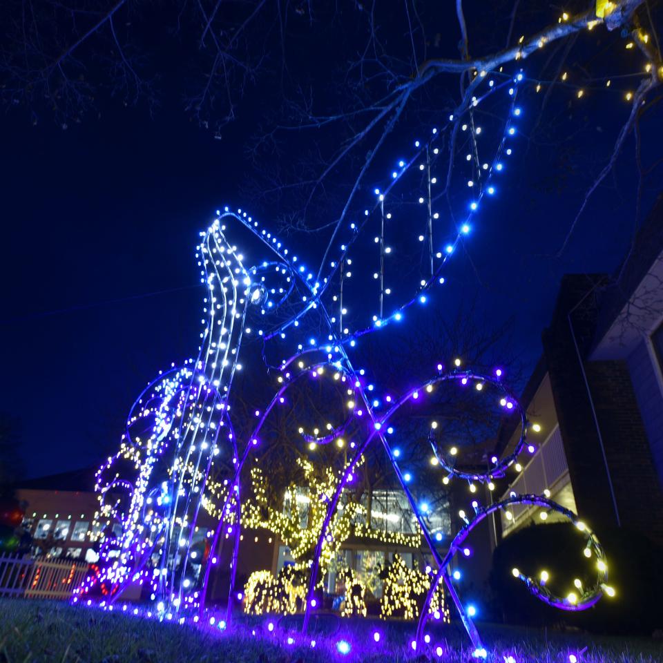 The lights of the Cape Codder's Enchanted Village lit up the night in Hyannis in 2019 featuring two new "Giants" from artist Michael Magyar.