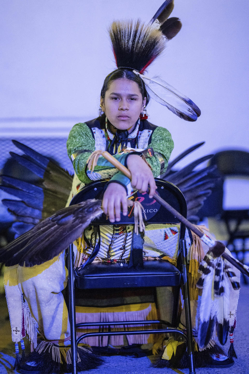 Fourteen year-old Roland Fields of Pawnee, Oklahoma waits his turn to dance in the prepares to dance in the Jr. Boys Traditional competition at the 40th anniversary of the Gathering of Nations Pow Wow in Albuquerque, N.M., Friday, April 28, 2023. Tens of thousands of people gathered in New Mexico on Friday for what organizers bill as the largest powwow in North America. (AP Photo/Roberto E. Rosales)