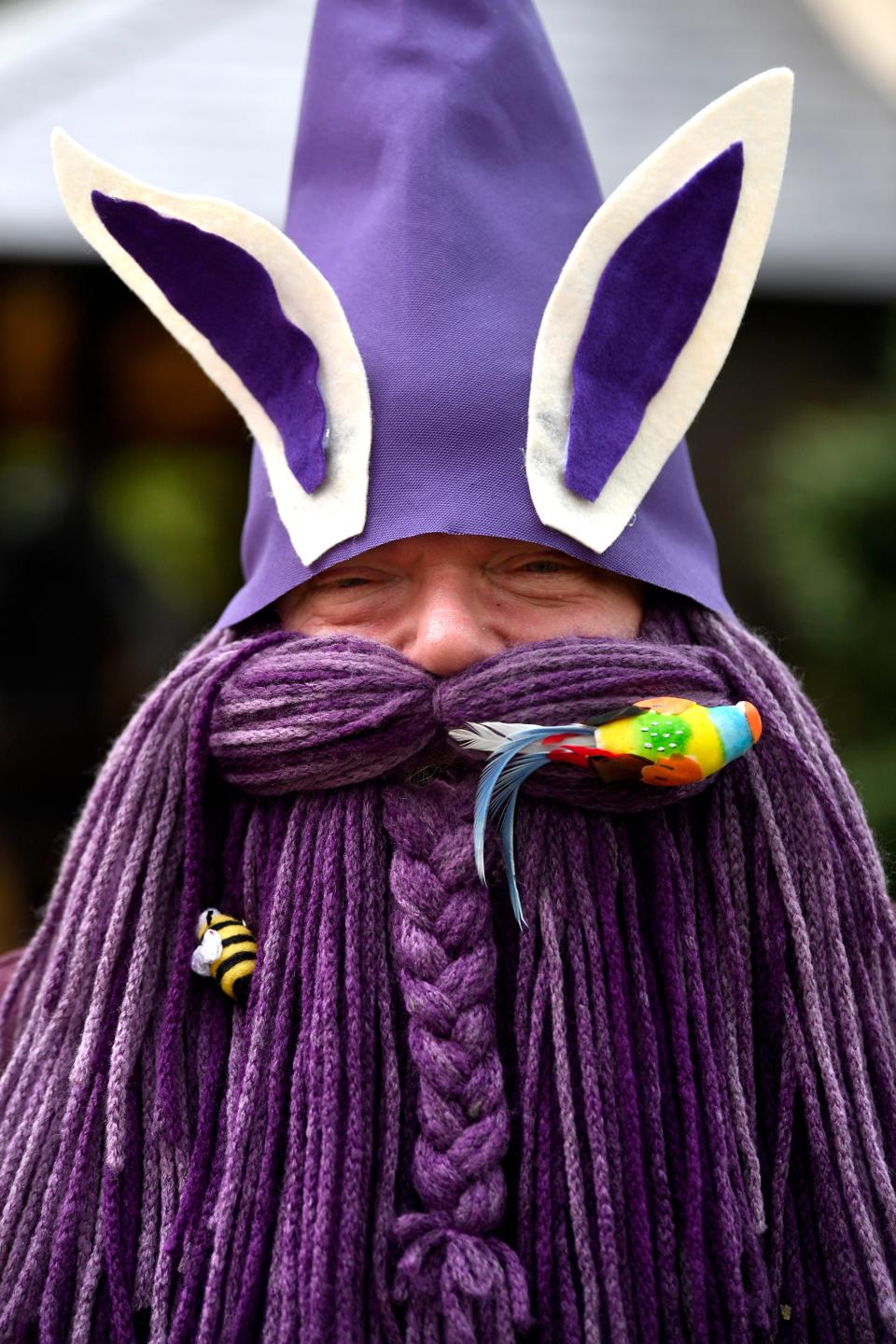 Jason McKinney of Lubbock sports his homemade gnome hat and beard, with rabbit ears added for Easter, during Scarborough Renaissance Festival in Waxahachie. The two-month festival has been a Central Texas tradition since 1981.