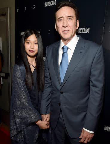 Michael Kovac/Getty Riko Shibata and Nicolas Cage