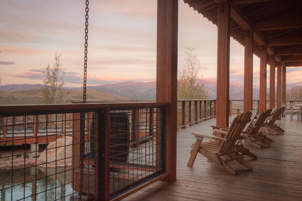 Adirondack chairs on the grounds of The Lodge at Blue Sky