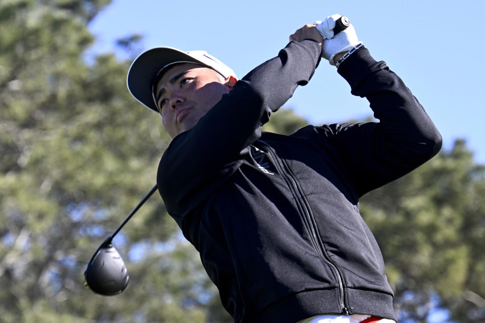 Taiga Semikawa, of Japan, watches his tee shot on the 18th hole of the North Course at Torrey Pines during the second round of the Farmers Insurance Open golf tournament Thursday, Jan. 26, 2023, in San Diego. (AP Photo/Denis Poroy)