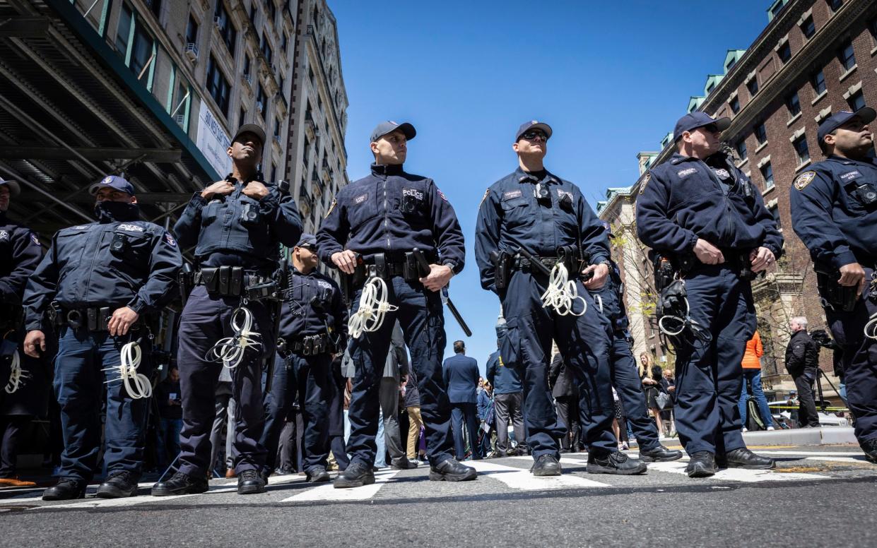 NYPD strategic response officers  outside the gates of Columbia University