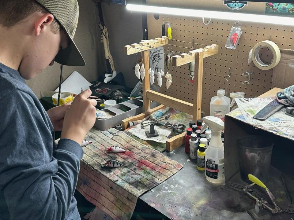 Peyton Copeland of Barlow combined his love of fishing and enjoyment of painting to create unique, hand-painted lures for bass fishing.