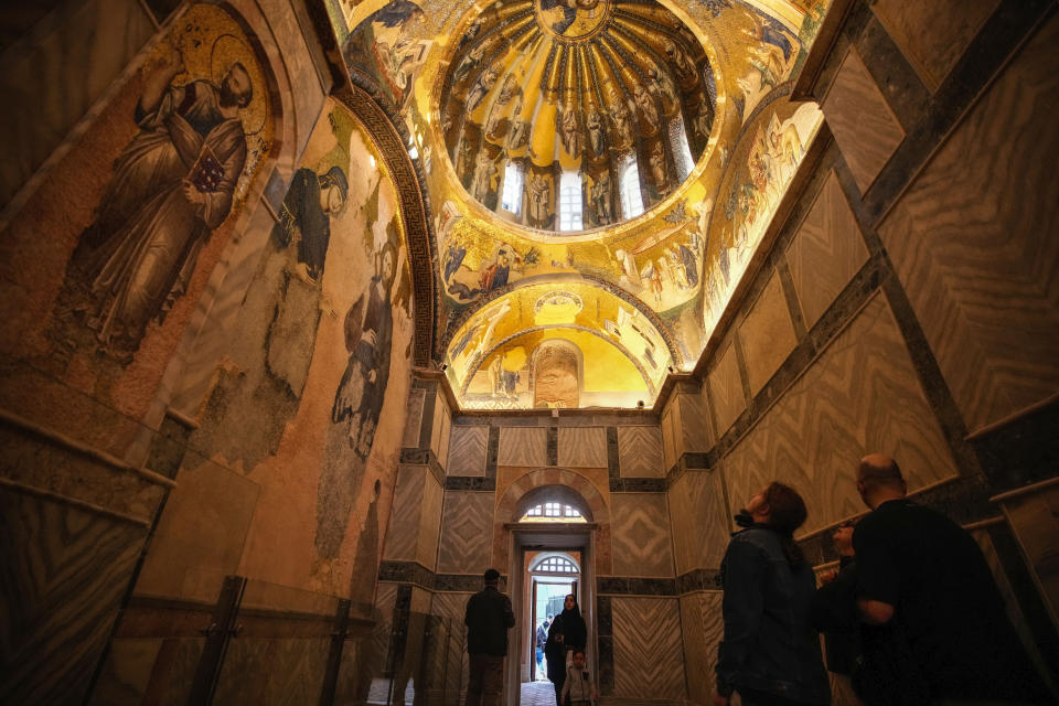 People visit a former Byzantine church which formally opened as a mosque, in Istanbul, Turkey, Monday, May 6, 2024. Turkish President Recep Tayyip Erdogan formally opened a former Byzantine church in Istanbul as a mosque on Monday, four years after his government had designated it a Muslim house of prayer, despite criticism from neighboring Greece. (AP Photo/Emrah Gurel)