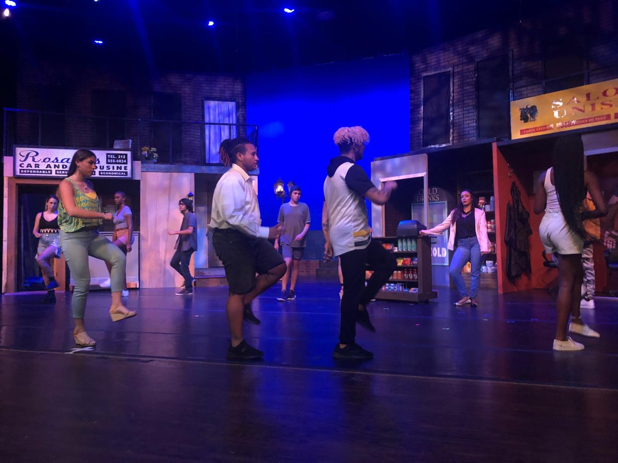 The cast of With Love Productions Inc.'s presentation of "In the Heights" practice dance sequences during a recent rehearsal in the Polk State College theater in Winter Haven.