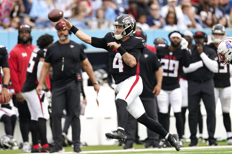 Atlanta Falcons quarterback Taylor Heinicke throws on the run after replacing starte Desmond Ridder during the second half of an NFL football game against the Tennessee Titans, Sunday, Oct. 29, 2023, in Nashville, Tenn. (AP Photo/George Walker IV)